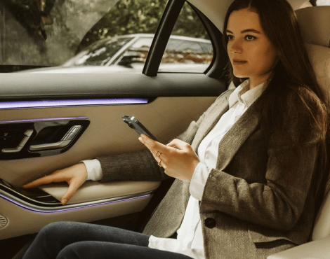 woman in a taxi gets an airport transfer